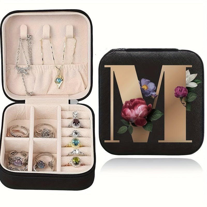 Floral initial jewelry organizer box with compact design, soft velvet lining, durable zipper, and lightweight, ideal for jewelry organization and travel.