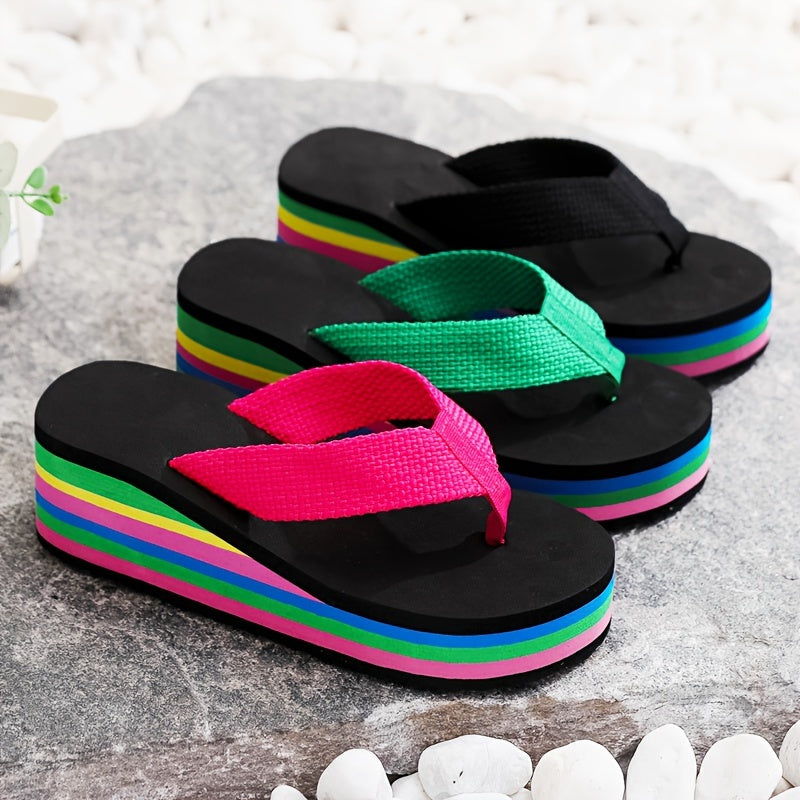 Summer clog flip flops with high heels and rainbow sole for seaside vacation.