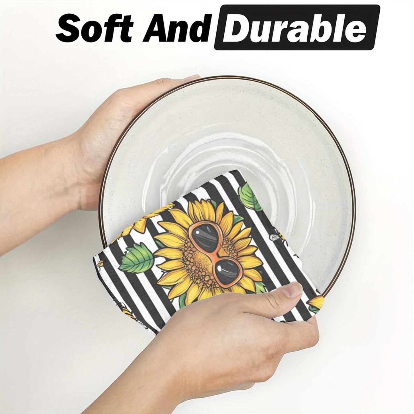 Two pieces of contemporary dish cloths featuring a sunflower pattern, made of woven polyester material. These oblong kitchen towels are designed with a floral theme and are suitable for hand wash only. Ideal for use in the kitchen.