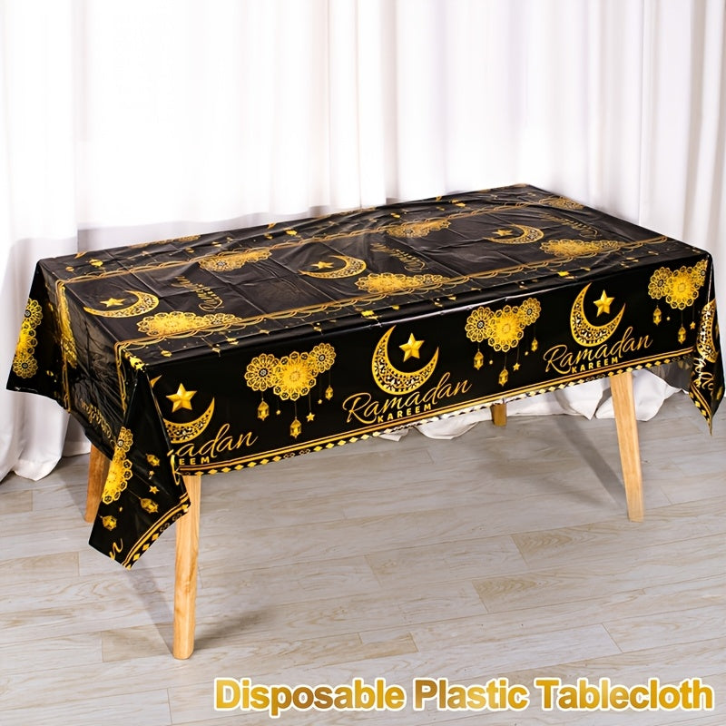 Ramadan-themed disposable plastic tablecloth with black and golden moon, lantern, and star design, sized 130x220cm. Perfect for Eid Al-Fitr & Eid Al-Adha celebrations.