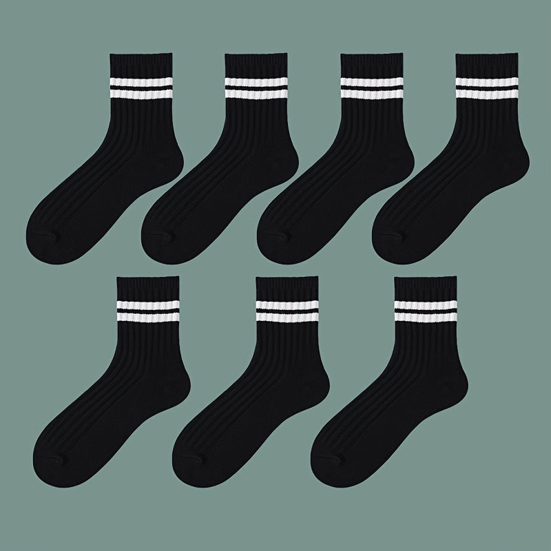 7 pairs of black and white thick mid-length socks for comfortable and breathable wear in autumn and winter.