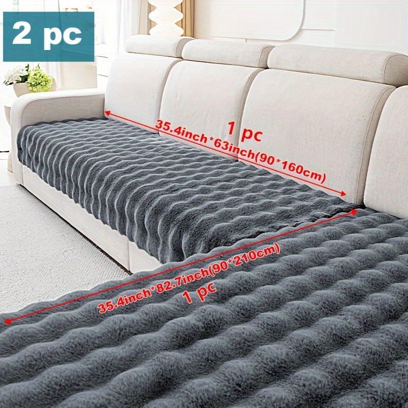 Luxurious faux rabbit fur sofa pads for winter warmth, pet-friendly, non-slip, machine washable, fits 2/3/4-seater sofas in grey color.