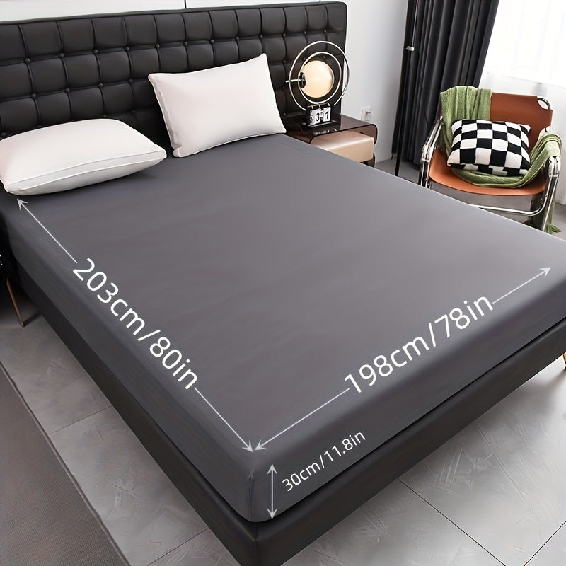 Upgrade your bedding with our Ultra-Soft Waterproof Fitted Sheet in Solid Black. Made with breathable and comfortable material, this sheet features deep pockets for a secure fit. Easy to machine wash, this sheet is perfect for any bedroom, guest room