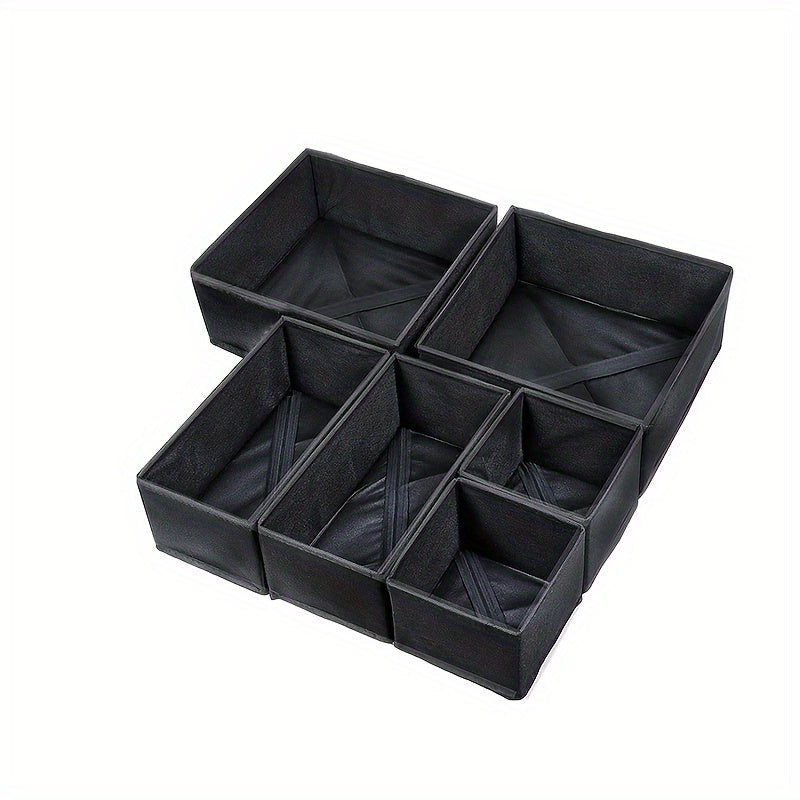 This 6-piece set of fabric drawer organizers is perfect for home organization. Each box is unfinished and foldable, making them versatile and easy to use. Suitable for ages 14 and up, these weather-resistant storage boxes are under 3.2 cubic feet and