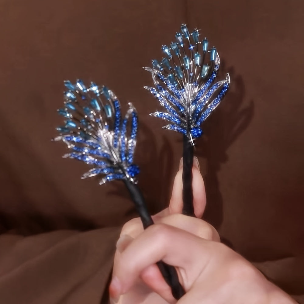 Feathered twist hair clip adorned with rhinestones