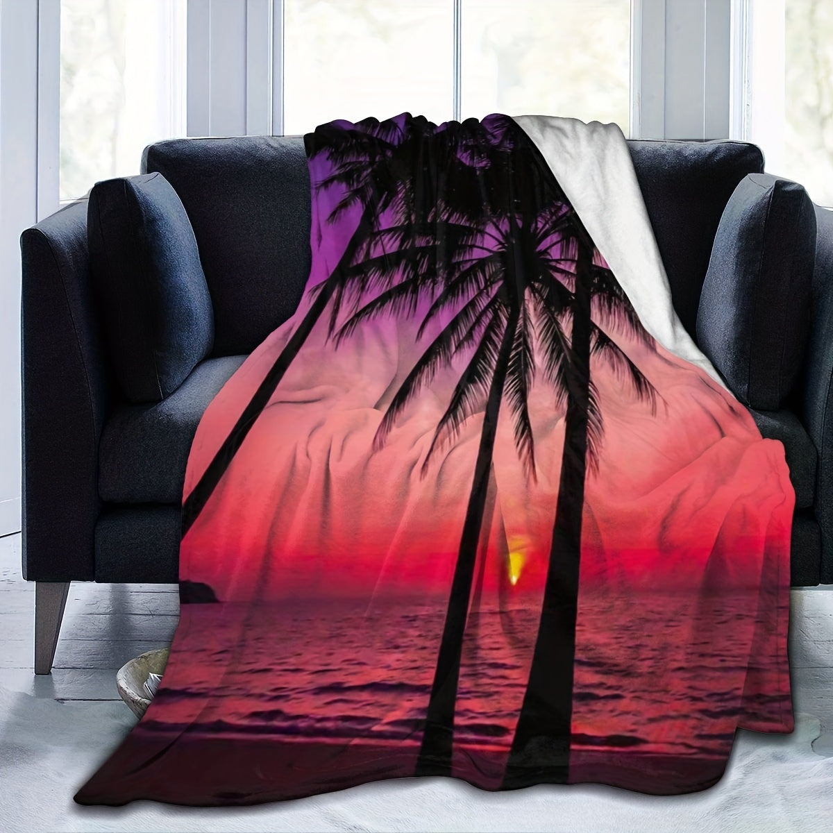 One piece of luxurious Cozy Flannel Fleece Blanket featuring an Ultra Soft Sunset Beach Palm Tree Design in a Contemporary Style. This All-Season Multipurpose Throw is perfect for Camping, Home Decor, Office, Sofa, and Travel. Made from Digital Print