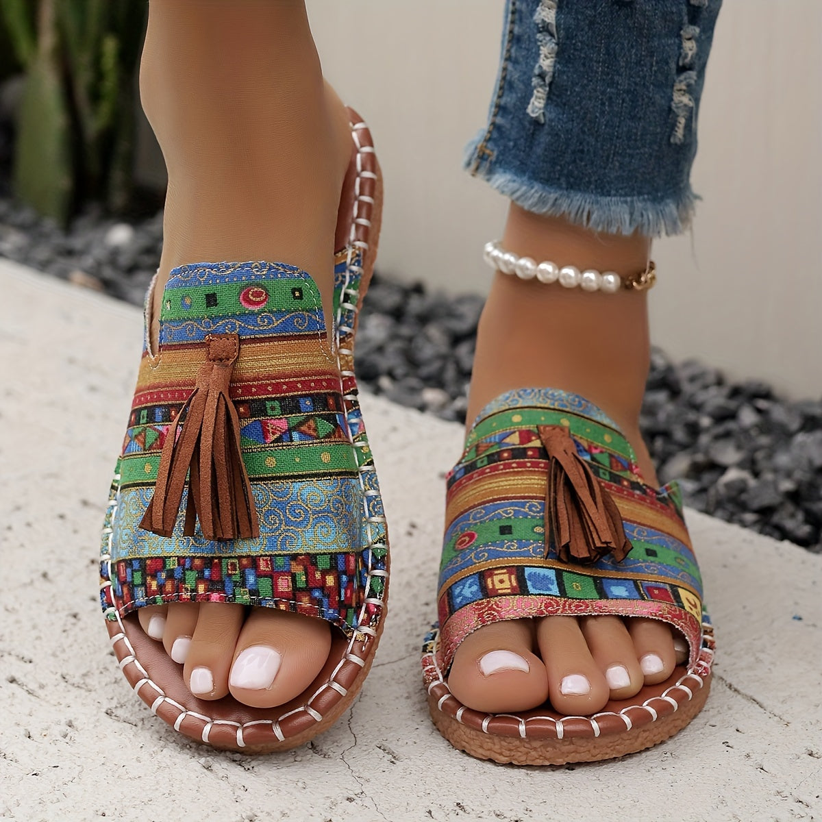 Bohemian canvas sandals with tassel and ethnic pattern, comfy slip-on slides for summer.