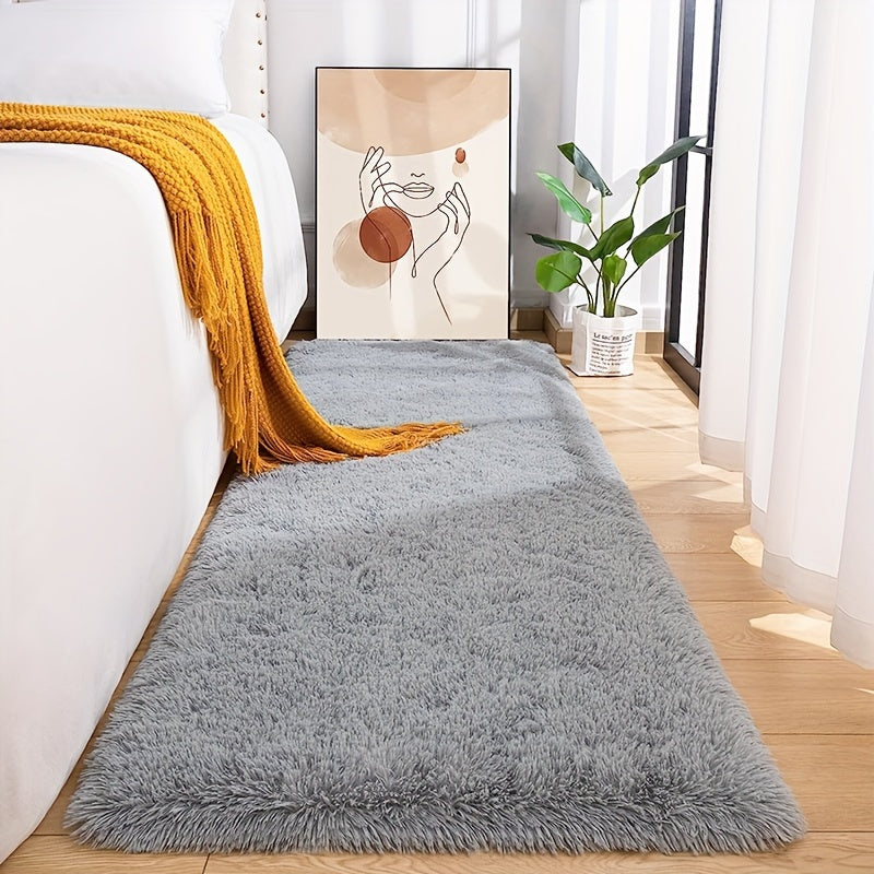 Soft and plush modern shaggy area rug, perfect for adding comfort and style to any indoor space. Made of polyester material, this decorative rug is ideal for living rooms, bedrooms, studies, and lounges. Dry clean only.