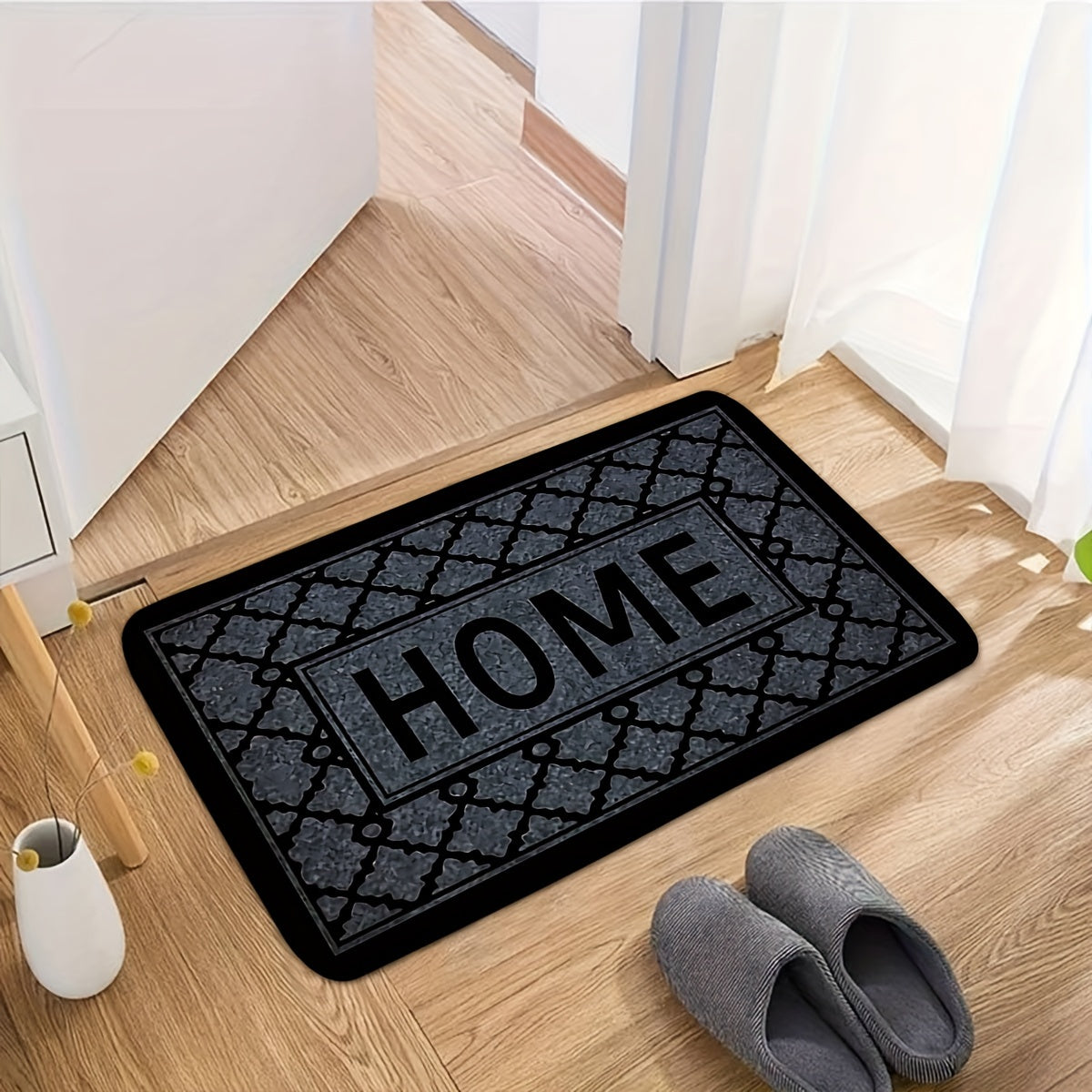 This kitchen flooring mat features a striking black foam design with irregular stripes and the word "HOME" pattern. Made of soft, thick flannel material, this non-slip mat is constructed from 1.2 foam sponge, making it ideal for bathroom and indoor