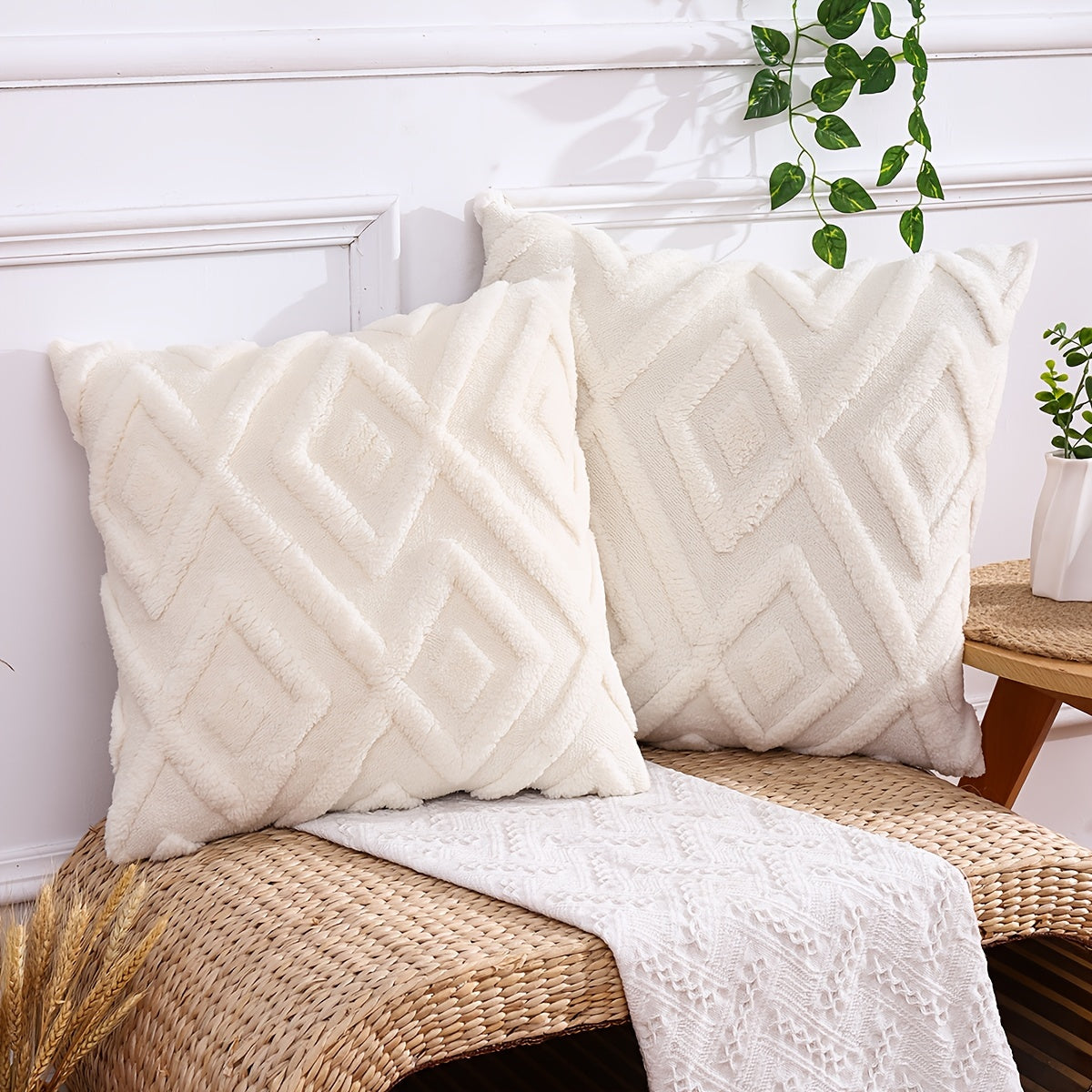 Pair of plush throw pillow covers in contemporary geometric pattern, hand wash only, 100% polyester zipper closure, beige wavy design for living room décor.