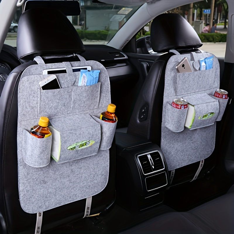 Multi-functional car seat back hanging storage bag for car interior.