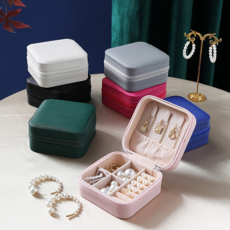 One stylish and portable jewelry box for earrings, rings, and necklaces.