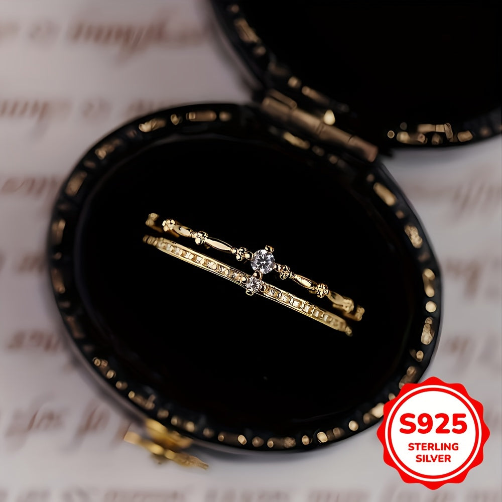 A stunning and elegant S925 silver zirconia double-layer crown ring that exudes luxury and vintage charm, making it the ideal gift for women on Valentine's Day or any special gathering.