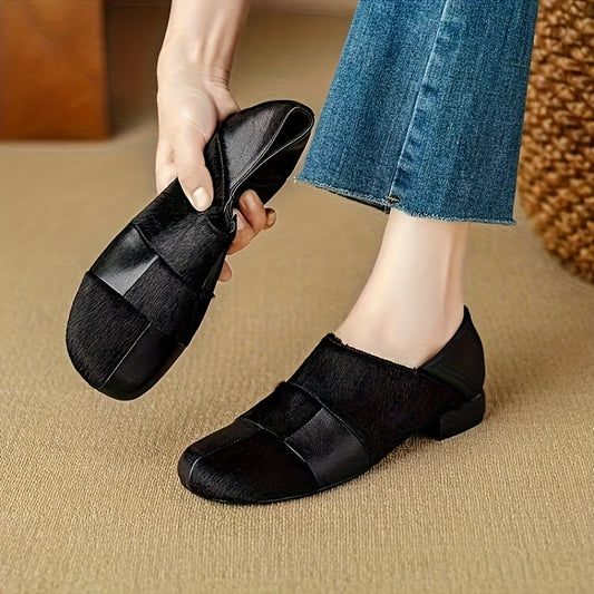 Vintage-inspired slip-on loafers for women with a solid color microfiber upper and rubber sole for comfort.