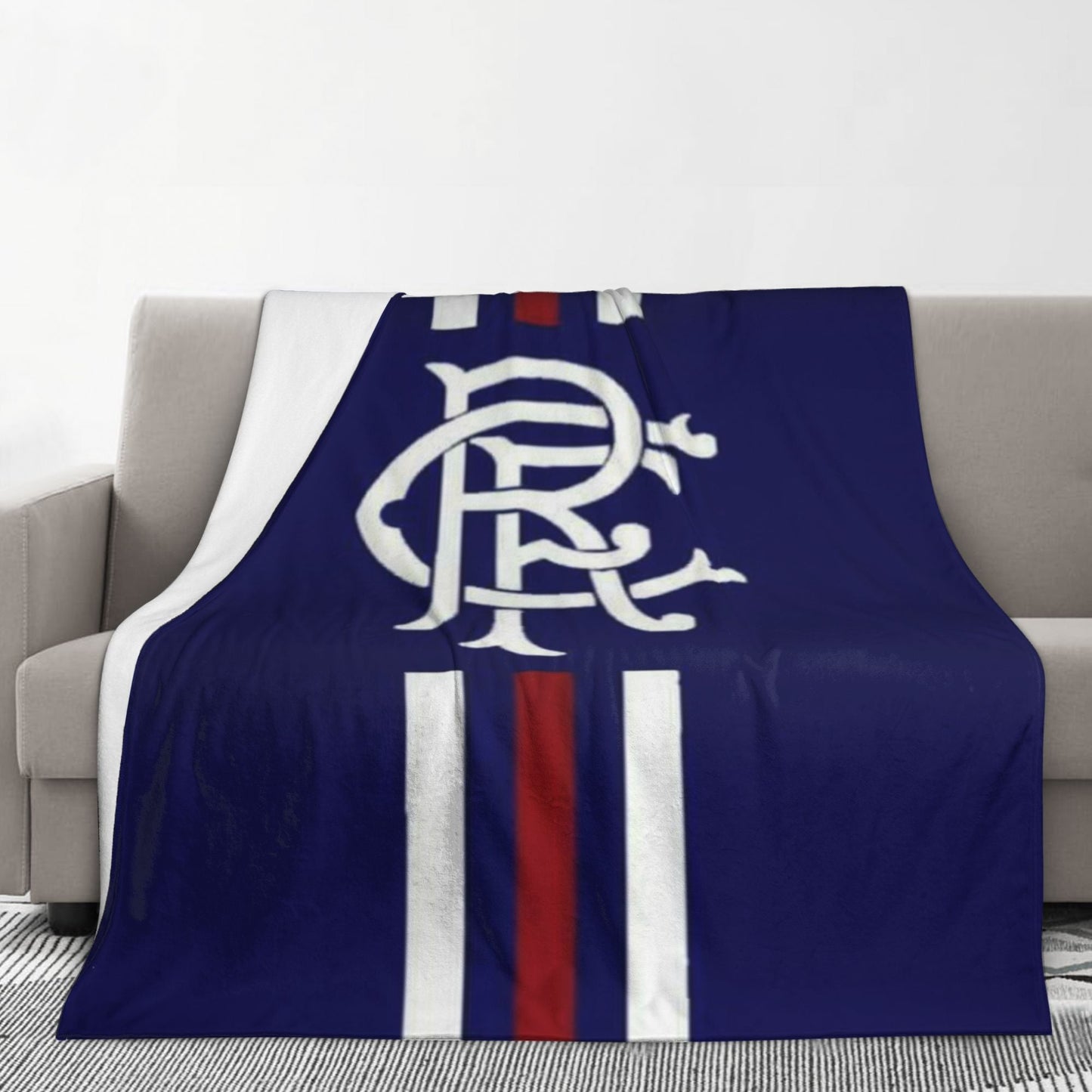 Stay cozy with this 1 piece Rangers Football Club printed flannel fleece blanket. Made with ultra soft plush flannel, this blanket is perfect for your bed or sofa all year round. Featuring a modern design and digital print craftsmanship, this blanket is