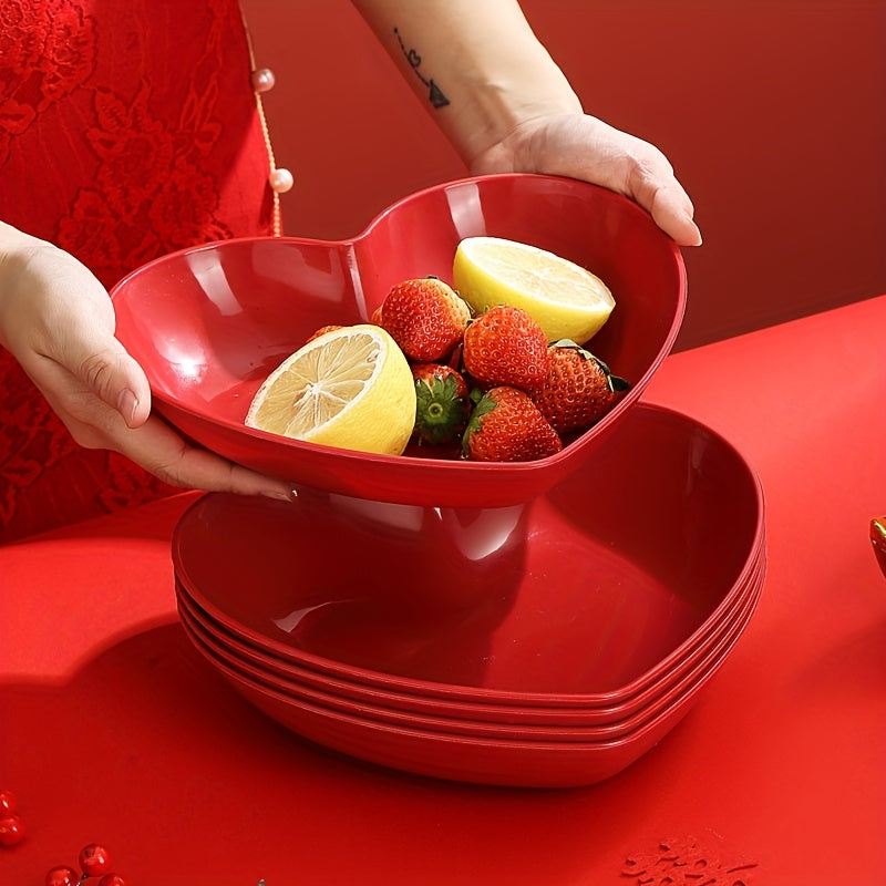 Heart-shaped plastic plates for weddings in sets of 4 or 8. Decorative red serving dishes for snacks, salads, and candy. Versatile party platters for all seasons.