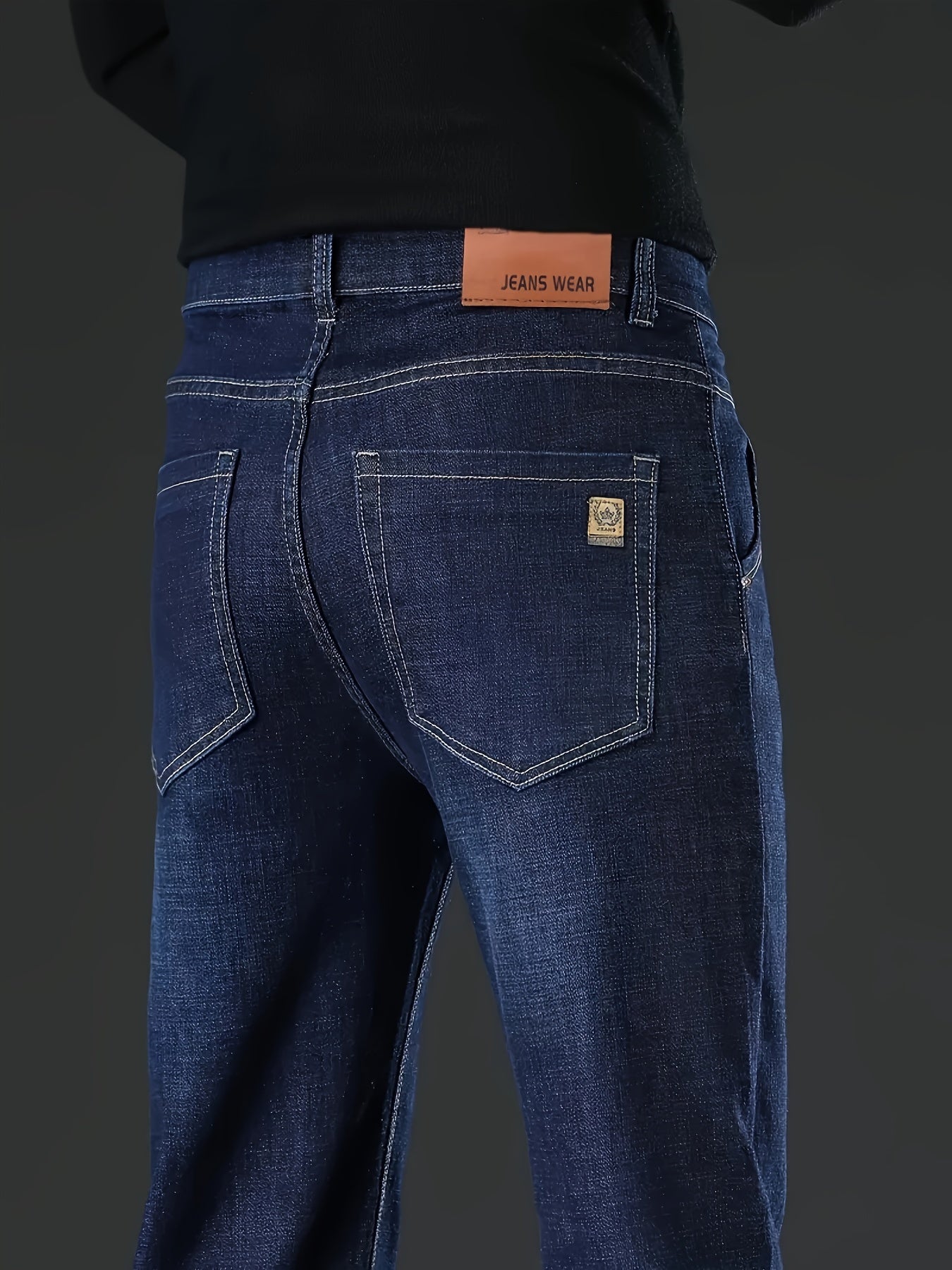 Men's straight-leg jeans in classic washed denim, made with a cotton-polyester blend and slight stretch for comfort. Solid color, regular fit, suitable for business casual attire.