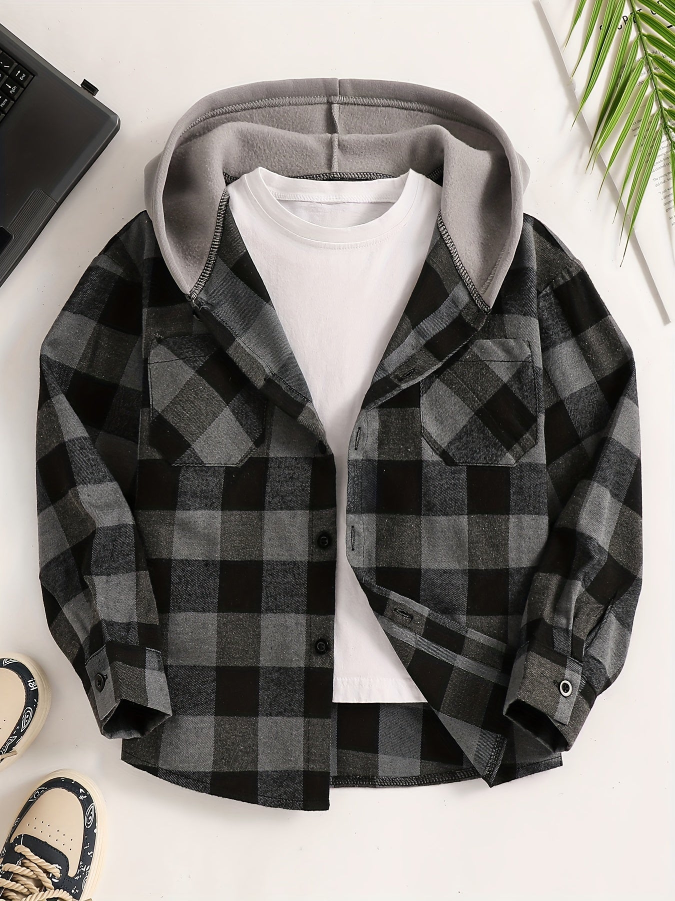 Boys' plaid hooded shirt in blue and black with flap pockets, made of cozy polyester for fall/winter casual wear.