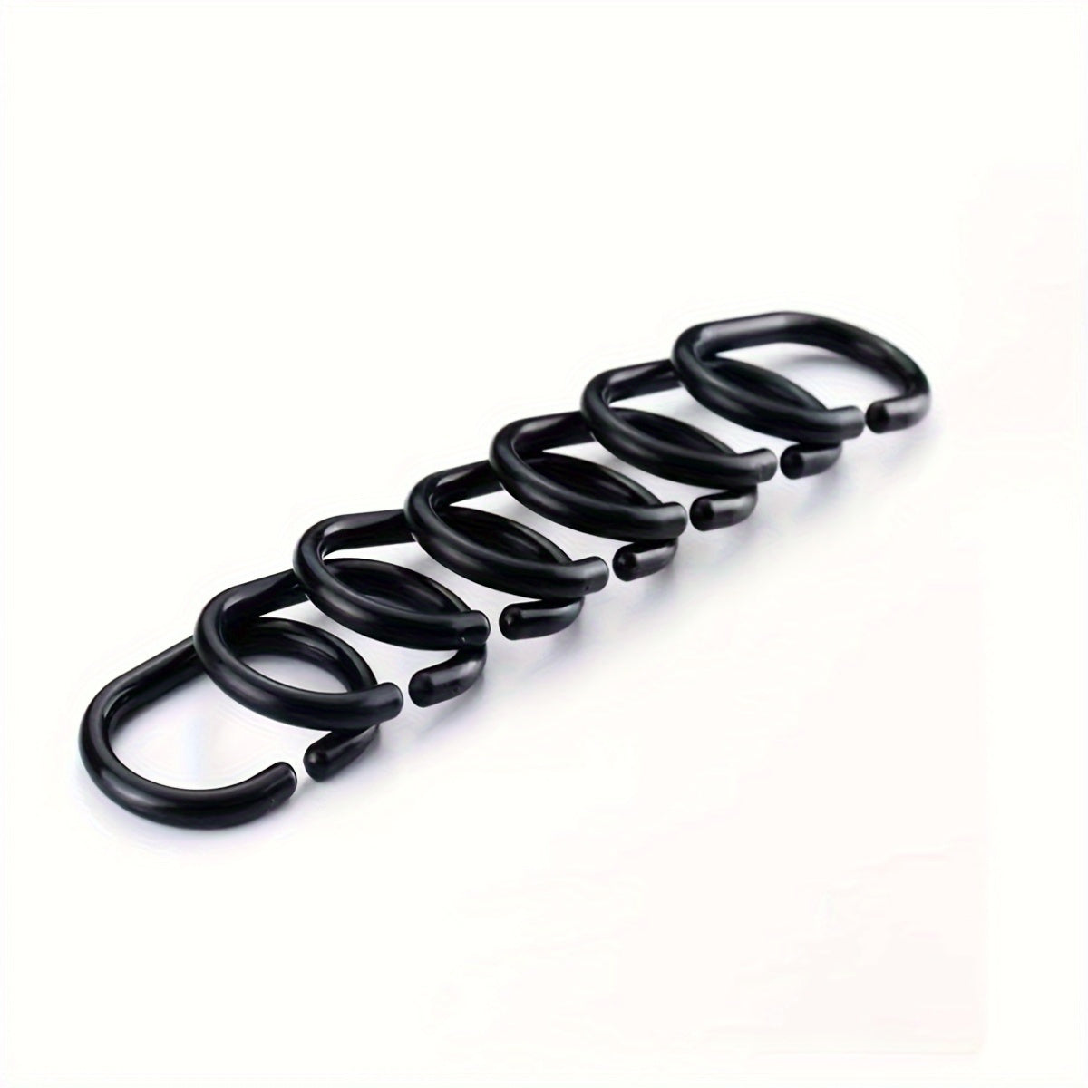 Eco-friendly plastic rings for shower rods - set of 30 durable C-shaped hooks.