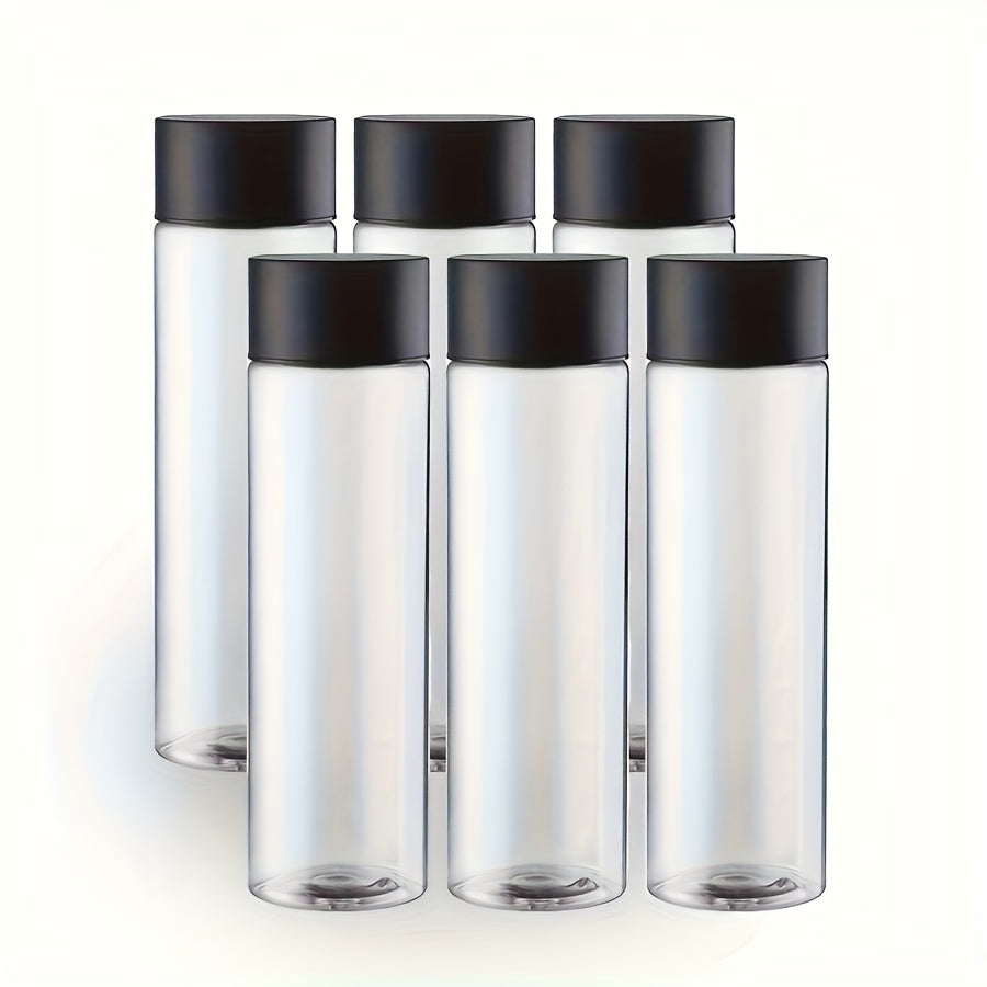 Six clear plastic sensory bottles with lids, each holding 10oz. These reusable water bottles are uncoated and perfect for classroom use, handmade crafts, and party supplies.