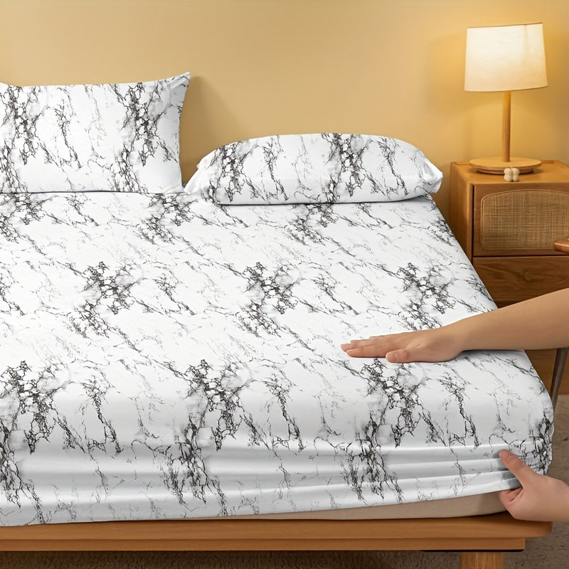 Get cozy with our 1 piece Brushed Fitted Sheet in a soft and comfortable marble print. This bedding essential is perfect for your bedroom, guest room, or any space needing a touch of luxury. Featuring deep pockets for a secure fit, this fitted sheet is