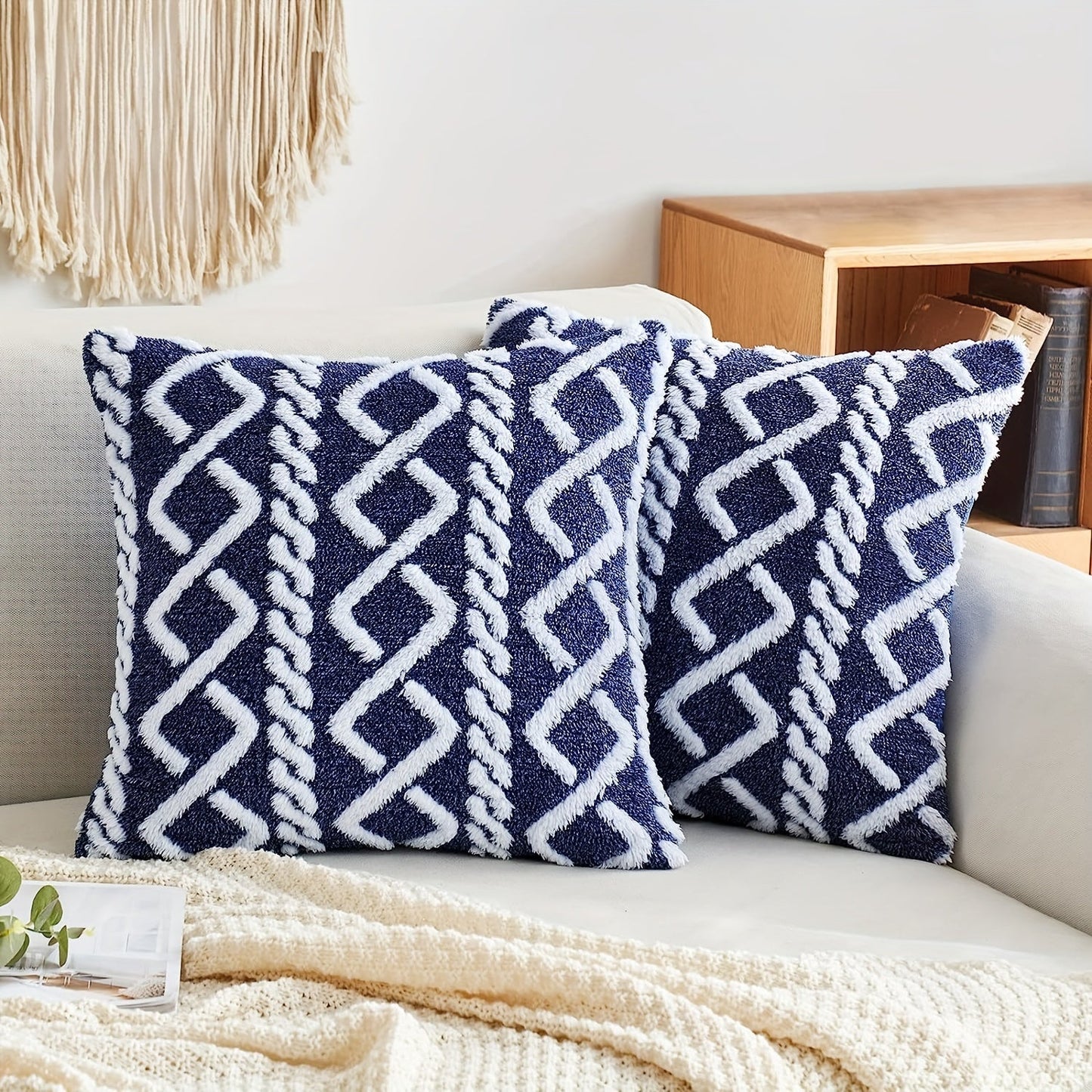 Soft plush geometric pattern throw pillow cover with a cozy and modern decorative cushion case featuring a zipper closure. Made of machine washable polyester in a blue and white herringbone design, perfect for use on the sofa or in the bedroom. Ideal for