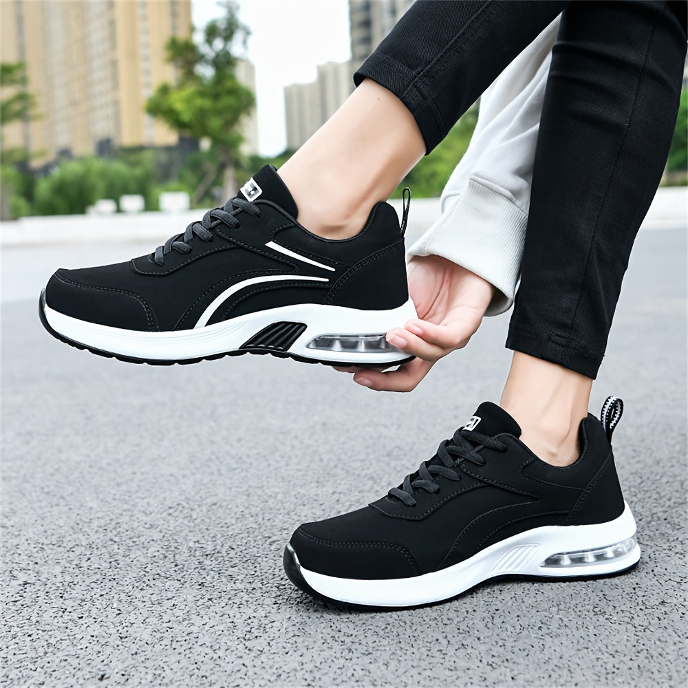 Women's casual sneakers made from black synthetic leather, featuring a lightweight design, air cushion support, lace-up style suitable for work, travel, or sports. Stylish and breathable