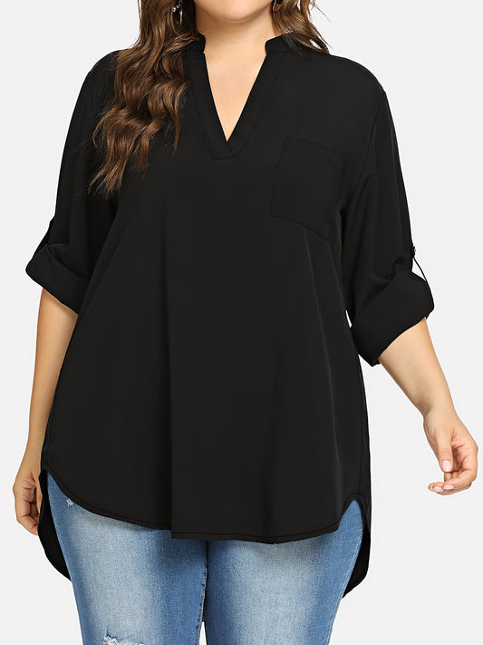 Women's plus size V-neck tunic top with long sleeves. Made of solid color polyester blend in a loose fit style, featuring a front short back long design with an H-line silhouette suitable