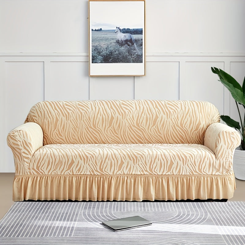 Wave pattern sofa slipcover with skirt, non-slip and dustproof. Protects furniture from cat scratches. Machine washable for easy cleaning. Suitable for bedroom, office, or living room décor.