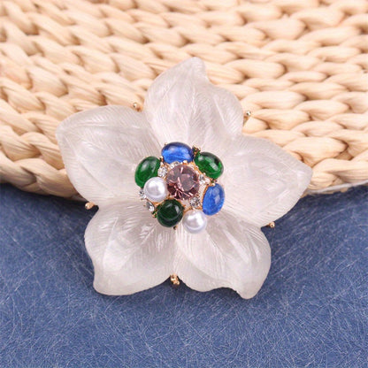 One piece of a luxurious iridescent floral brooch pin adorned with rhinestones. This elegant accessory features a novel simulated modeling design, making it a versatile fashion addition to clothing, bags, and hats.