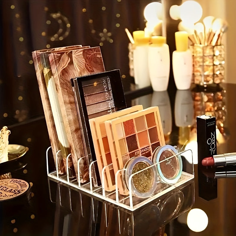 Transparent desktop makeup holder with 7 grids for eyeshadow palette and powder storage. Can be used in drawers or on desktops as a cosmetics organizer.