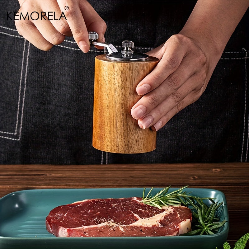 Get your hands on the 2-piece KEMORELA European Solid Wood Pepper Grinder. This manual salt and pepper mill will freshly grind your spices, perfect for seasoning steak and pasta in your home kitchen. No power is required for this wooden kitchen gadget