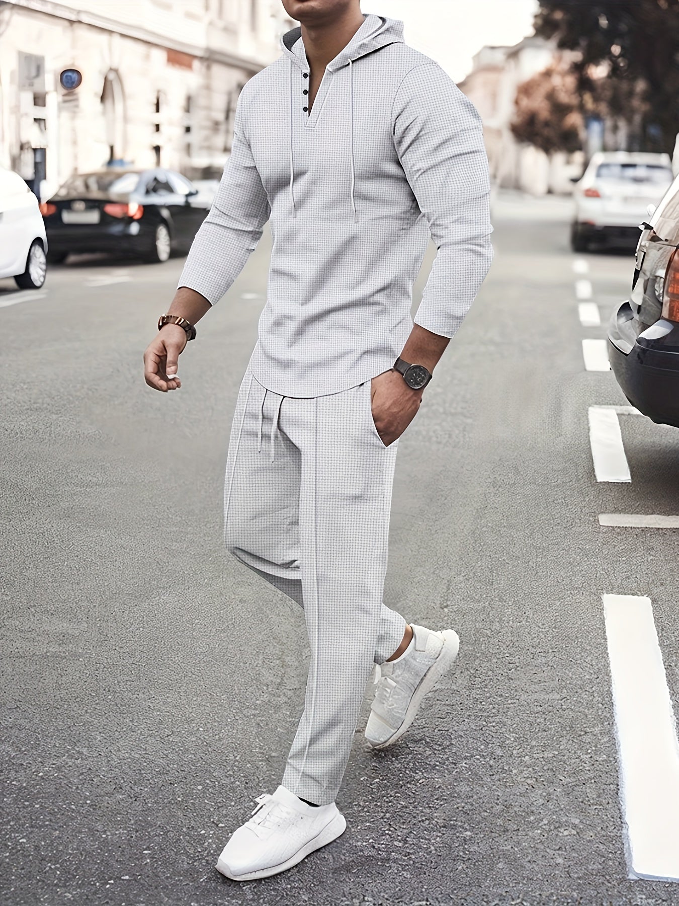 Men's long sleeve hoodie and pants set in solid color waffle knit for casual autumn style.