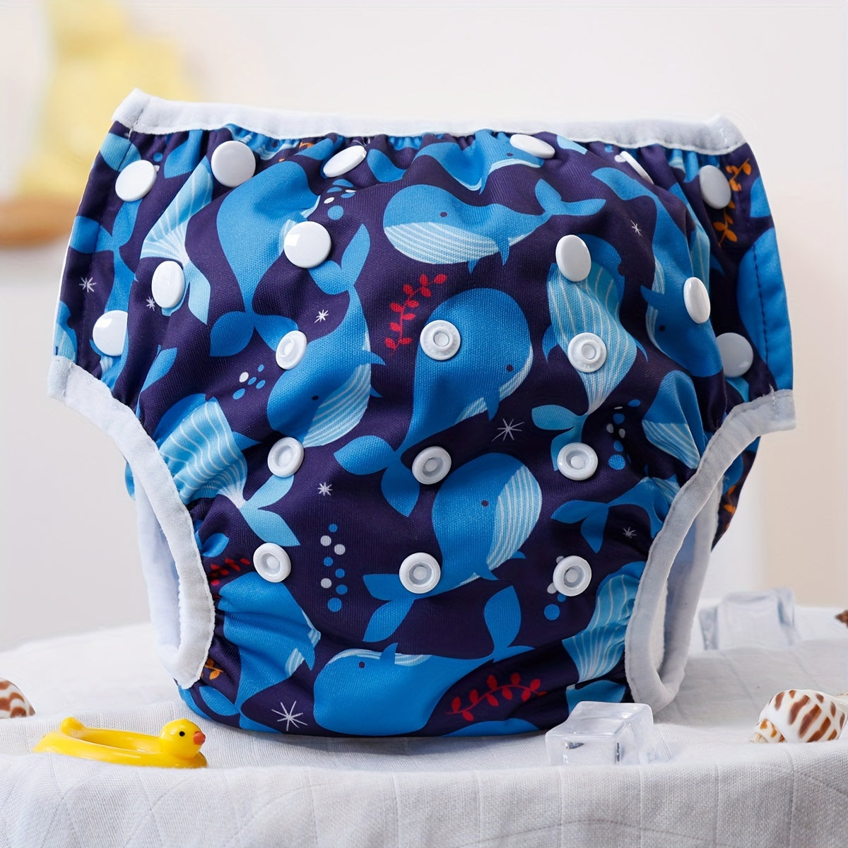 Soft, breathable, and waterproof swim wear for babies and newborns. These adjustable, easy-wash swim diapers are reusable for convenient and eco-friendly use.