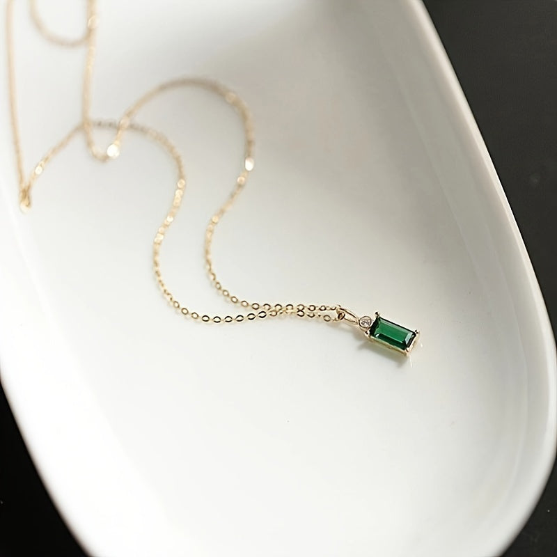 Stylish Emerald Green Princess Square Necklace made of 2.1g of high-quality 925 Sterling Silver featuring a dazzling Cubic Zirconia Pendant. This Elegant Clavicle Chain is ideal for everyday wear or as a thoughtful gift. Representing the August