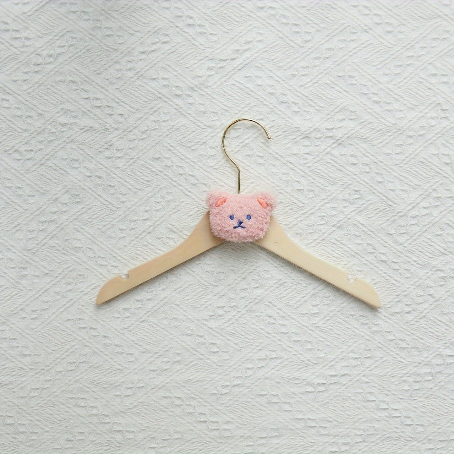 Durable and Lightweight Wooden Clothes Hangers featuring a Nordic Style Cartoon Bear Design, with Swivel Hooks for easy maneuvering. Recommended for Ages 14 and up.