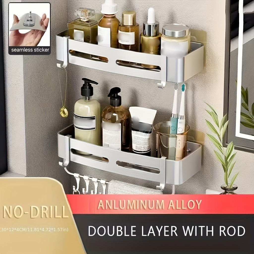 Wall-mounted bathroom storage rack for shampoo, shower gel, and cosmetics; made of space aluminum with no need for drilling.