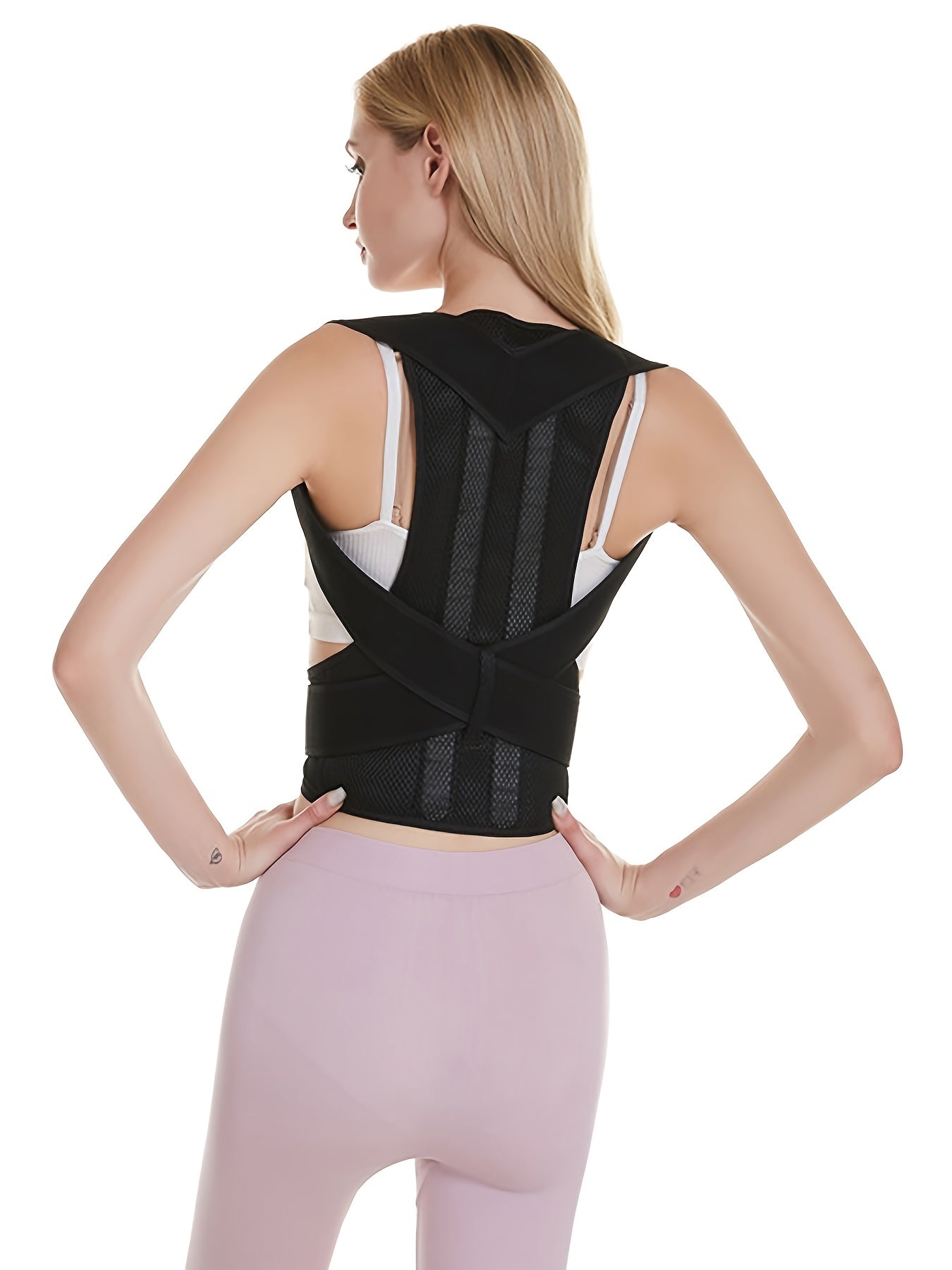 Flexible posture corrector vest with lumbar and shoulder support for improved posture and back pain relief.