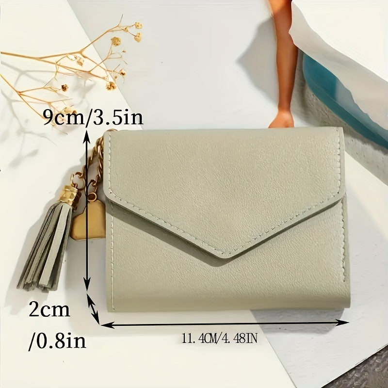 Compact trifold wallet for women with faux clutch coin purse, minimalist credit card holder, stylish tassel charm, and versatile for daily use.