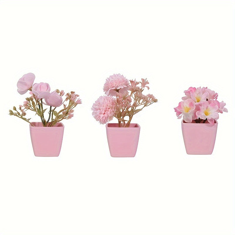 3 mini pink potted plants with faux rose and peach embroidered ball flowers for wedding, home, or office decoration.