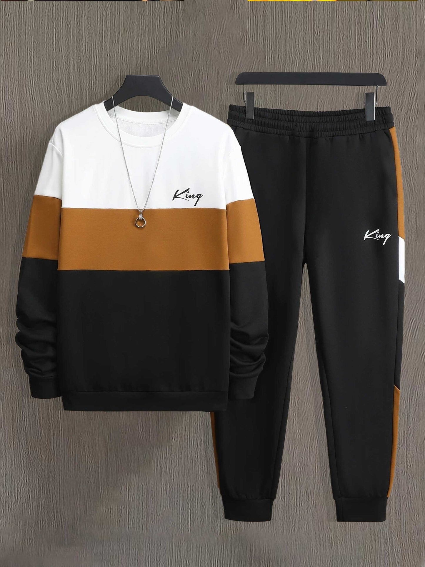 Men's color-blocked sportswear for spring and autumn with a printed long-sleeve crew neck sweatshirt and drawstring jogger pants.