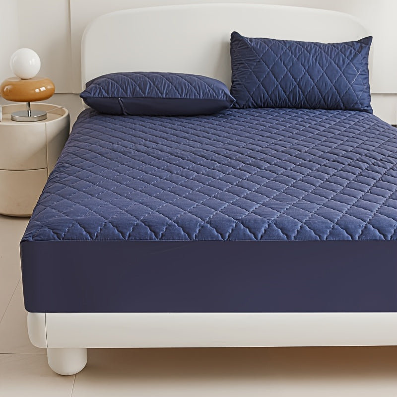 Diamond quilted waterproof bed sheet protector made of 100% woven polyester. Machine washable and available in multiple sizes (pillow shams not included).