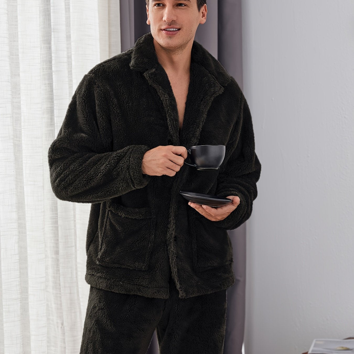 Warm and cozy men's fleece pajama set with pockets, perfect for winter. Features long sleeve top and pants. Machine washable.