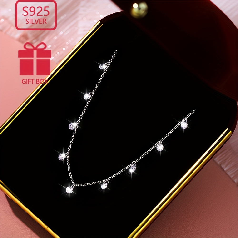 This elegant collarbone chain designed for women is crafted from 925 silver with stunning zirconia inlays. It shines beautifully and is perfect for both travel and everyday wear. Lightweight and low allergy, weighing approximately 1.7g.