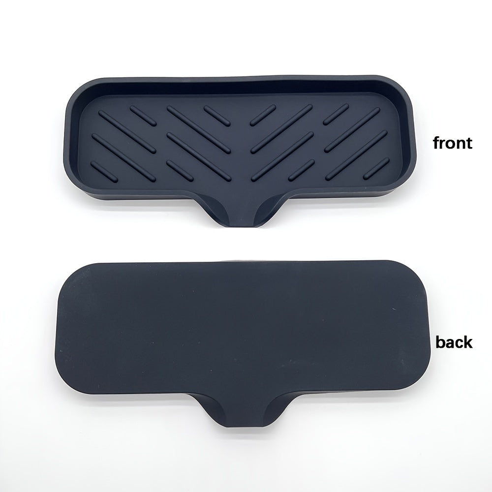 Silicone soap dish with self-draining tray for kitchen or bathroom sink, also functions as a non-slip sponge holder and soap saver pad.