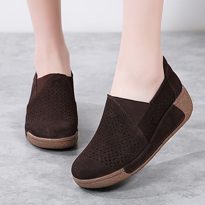 Breathable slip-on sneakers for women with hollow design, round toe, and non-slip PU sole.