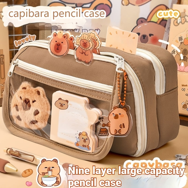 6-piece Capybara pencil case set with zipper, includes canvas bag, transparent storage box with compartment, doll, stickers, clips, and notepad.