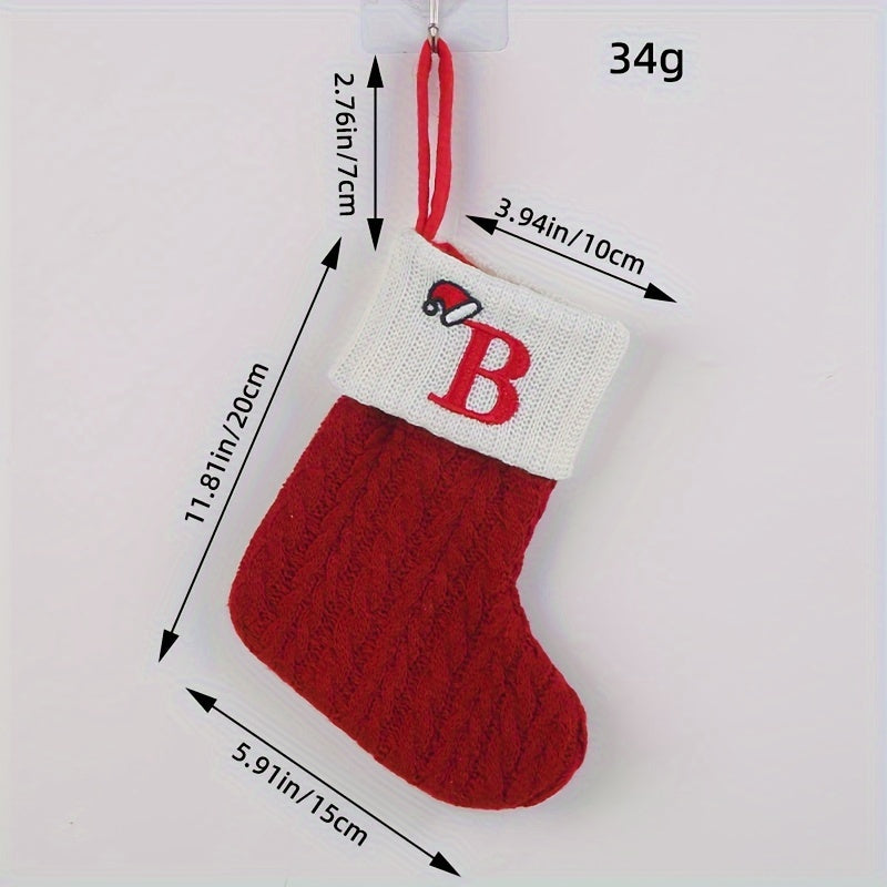 Knitted letter Christmas socks for home tree ornaments; red socks in gift bag for festive attire.