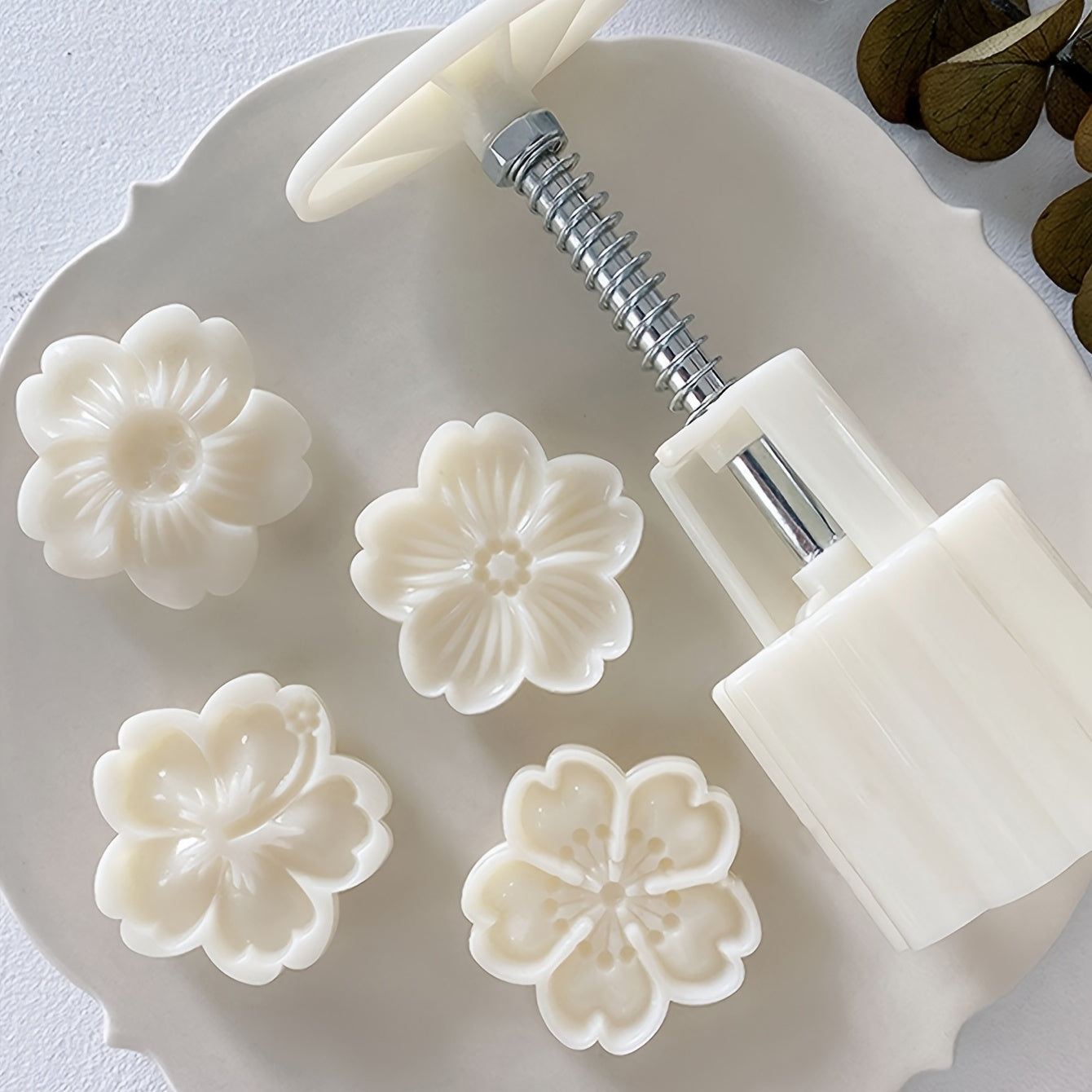 Mooncake embossed dessert plastic mold set includes 4 pieces. The set also includes a pressing mold.