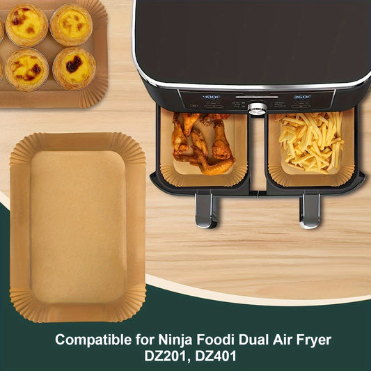 Disposable air fryer liners available in packs of 50, 100, or 200. These rectangular paper liners are designed to fit air fryer pots and basket bowls measuring 26.01cm by 16.99cm. Perfect for baking trays, ovens, and various kitchen accessories and